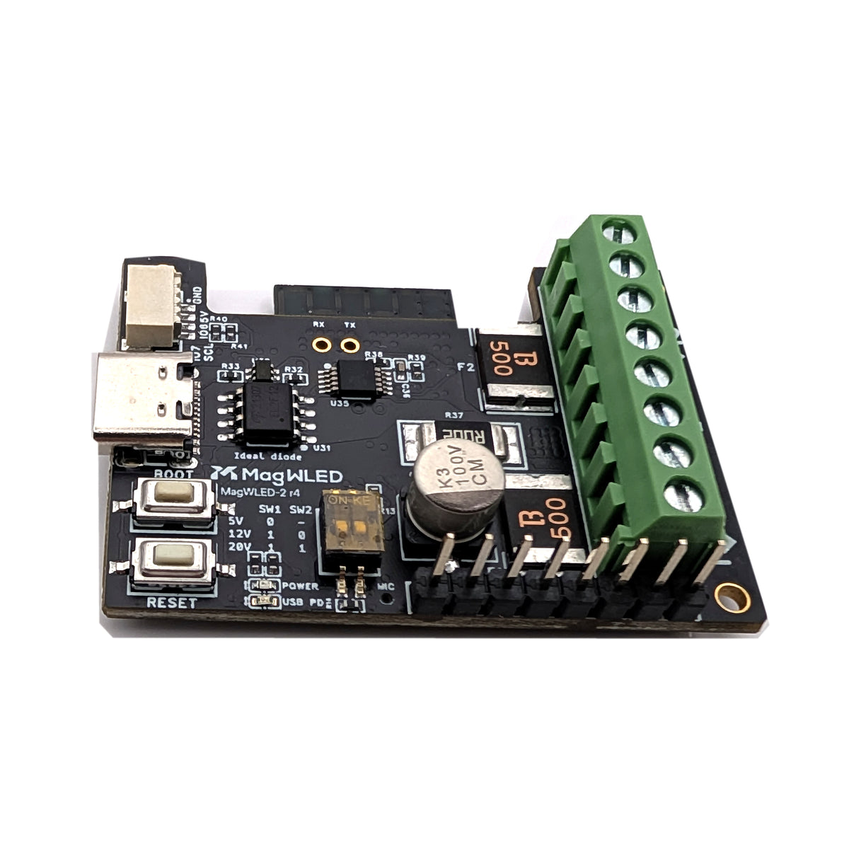 Angled top view of the MagWLED-2 LED strip controller, showing the green screw terminals, USB-C port and GPIO header.